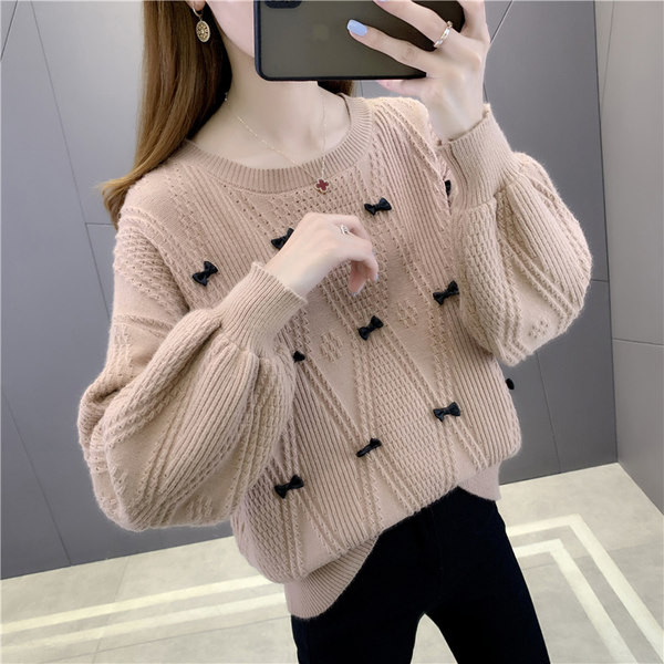 Új modell női pulóver szalagokkal