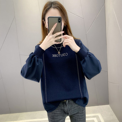 Modern női pulóver ovális nyakkivágással és hímzett felirattal