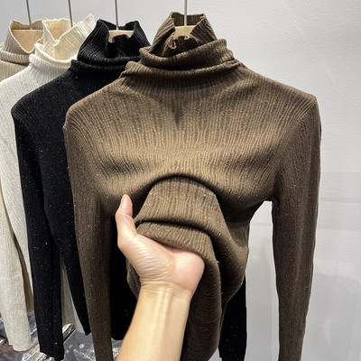 Modern női pulóver fényes részecskékkel és magas gallérral