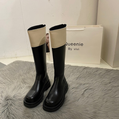 Lapos talpú női bőrcsizma