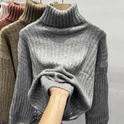 Női kordbársony pulóver magas gallérral