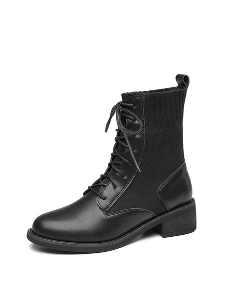 Női csizma fűzővel és gumival