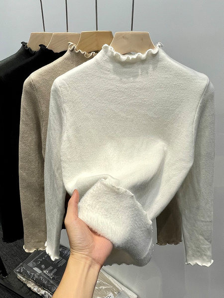 Alkalmi női pulóver fürtökkel