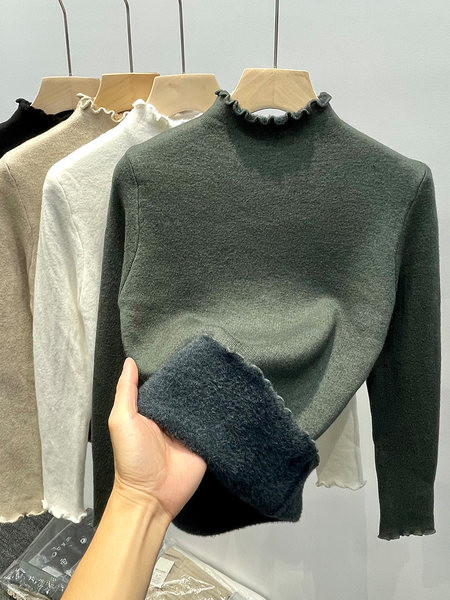 Alkalmi női pulóver fürtökkel