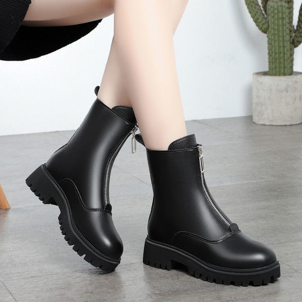 Modern női bőrcsizma lekerekített cipzárral