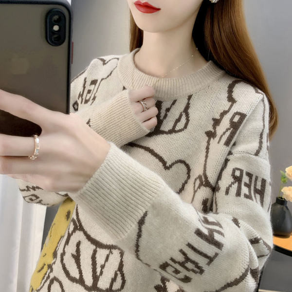 Női téli pulóver ovális nyakkivágással és hímzéssel