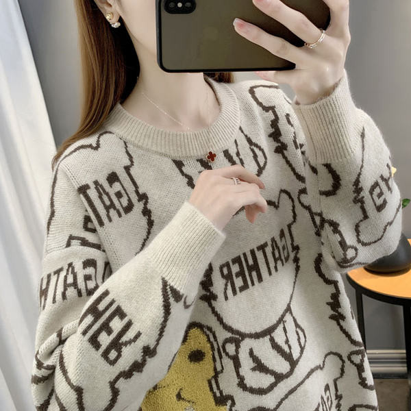 Női téli pulóver ovális nyakkivágással és hímzéssel