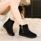 Naiste musta ja pruuni värvi lukuga talvesaapad