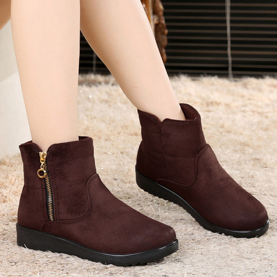 Naiste musta ja pruuni värvi lukuga talvesaapad