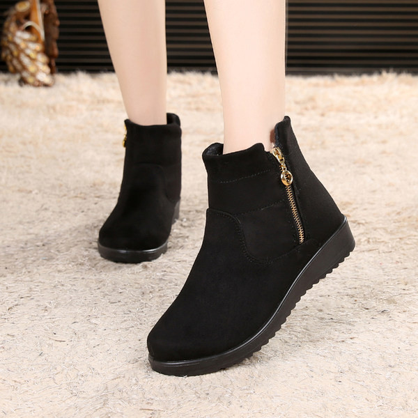 Naiste musta ja pruuni värvi lukuga talvesaapad