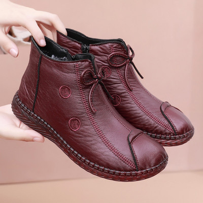 Pruuni ja musta paelaga naiste saapad