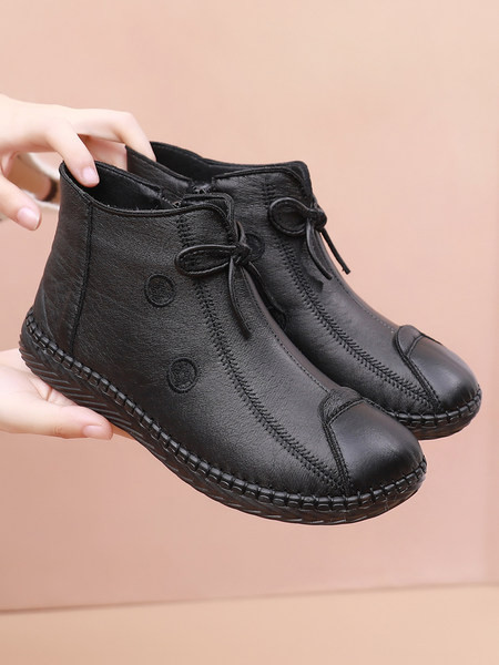 Pruuni ja musta paelaga naiste saapad