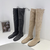 Naiste kunstnahast lipsudega saapad