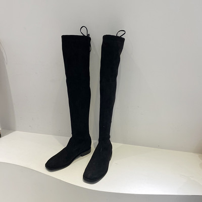 Naiste kunstnahast lipsudega saapad