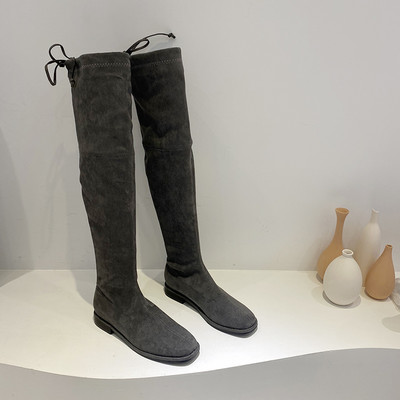 Naiste kunstnahast lipsudega saapad