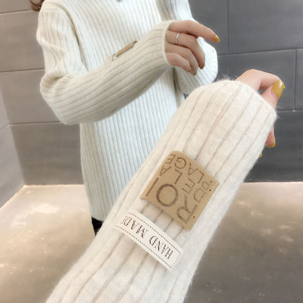 Μοντέρνο γυναικείο πλεκτό πουλόβερ με ψηλό γιακά