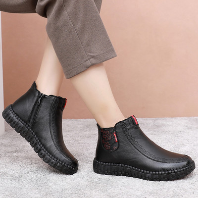 Kahes värvitoonis küljetõmblukuga naiste nahast saapad