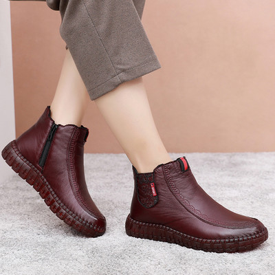 Kahes värvitoonis küljetõmblukuga naiste nahast saapad