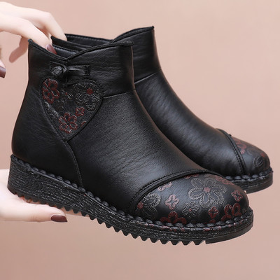 Lameda talla ja tikitud lilledega naiste saapad