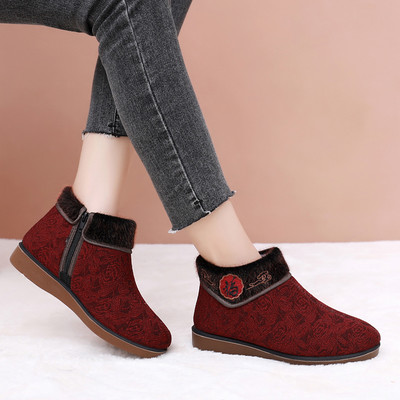 Naiste sule ja tikandiga talvesaapad