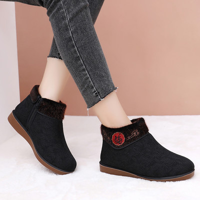 Naiste sule ja tikandiga talvesaapad