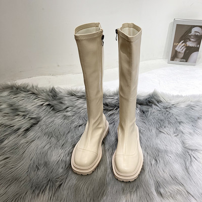 Naiste põlvikud tõmblukuga saapad