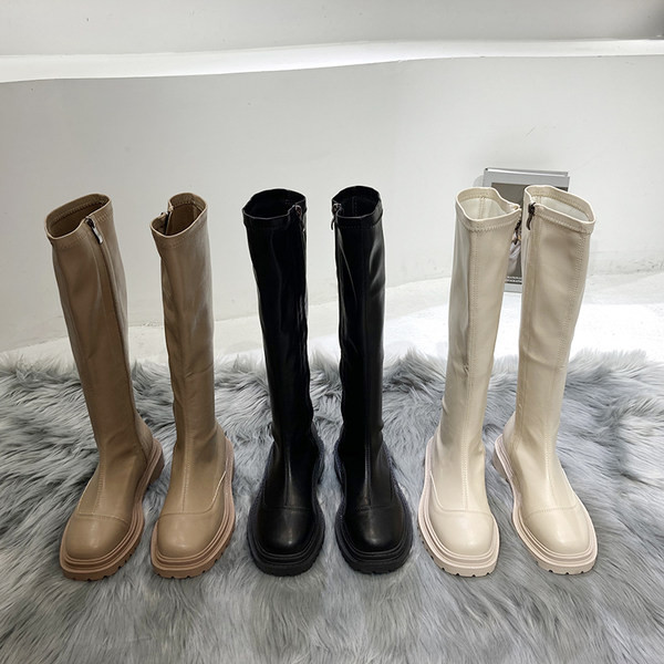 Naiste põlvikud tõmblukuga saapad