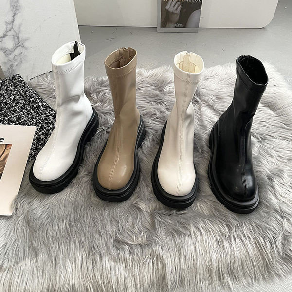 Naiste tõmblukuga nahast saapad - ümar mudel