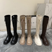 Neljas värvitoonis paeltega naiste nahast saapad