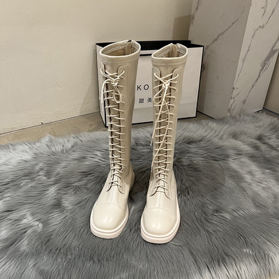 Neljas värvitoonis paeltega naiste nahast saapad