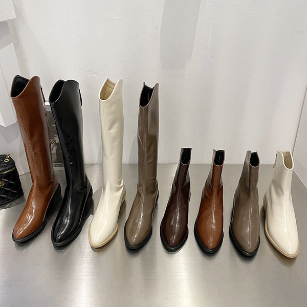 Naiste terava otsaga saapad ja tõmblukk