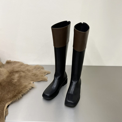 Naiste musta värvi kunstnahast saapad