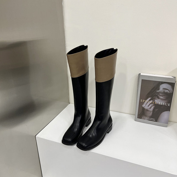 Naiste musta värvi kunstnahast saapad