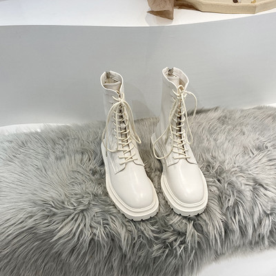 Paelte ja küljetõmblukuga nahast saapad