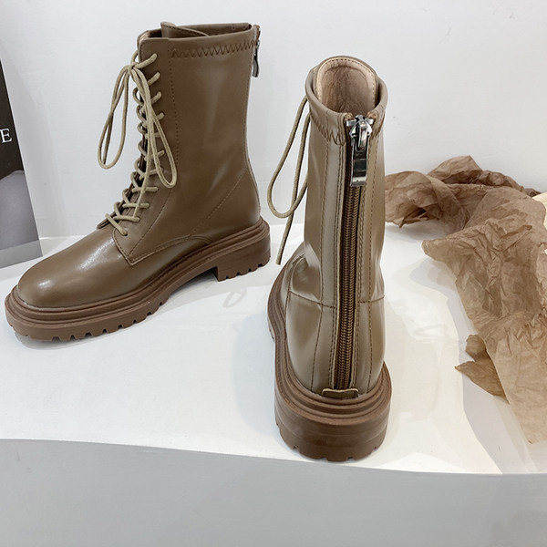 Paelte ja küljetõmblukuga nahast saapad