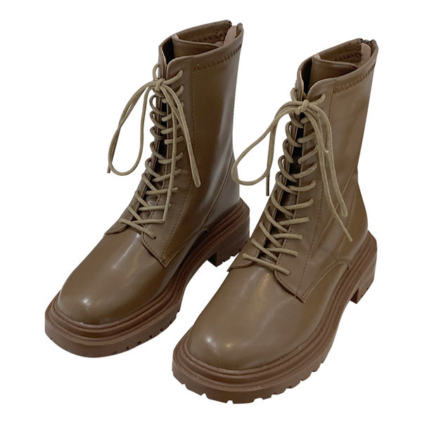 Paelte ja küljetõmblukuga nahast saapad