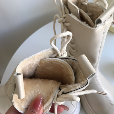 Naiste paelte ja sooja voodriga nahast saapad