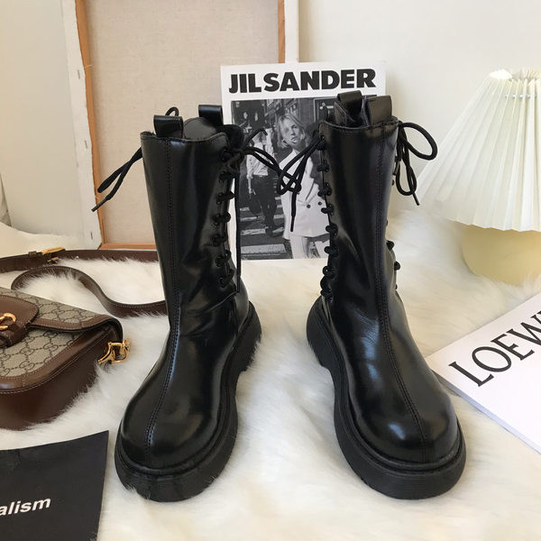 Naiste paelte ja sooja voodriga nahast saapad