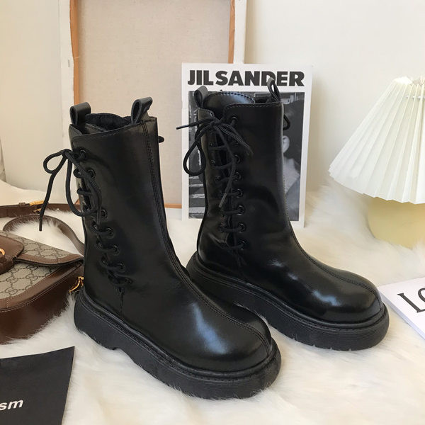 Naiste paelte ja sooja voodriga nahast saapad