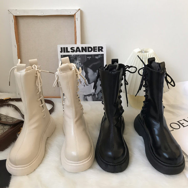 Naiste paelte ja sooja voodriga nahast saapad