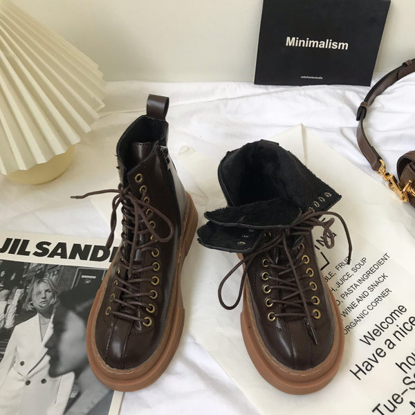 Öko-nahast valmistatud vabaaja naiste saapad pruunide paeltega