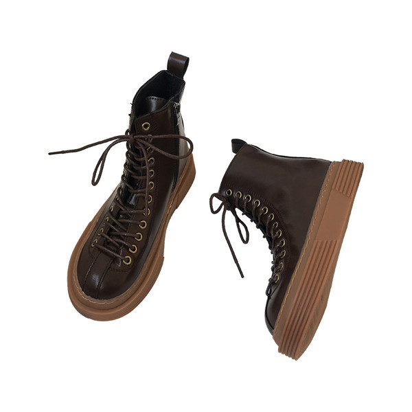 Öko-nahast valmistatud vabaaja naiste saapad pruunide paeltega