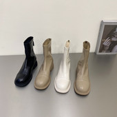 Naiste ühevärvilised lukuga kunstnahast saapad