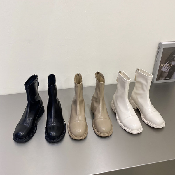 Naiste ühevärvilised lukuga kunstnahast saapad