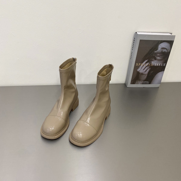 Naiste ühevärvilised lukuga kunstnahast saapad