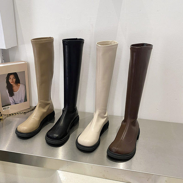 Naiste põlvikud saapad, puhtast ökonahast mudel