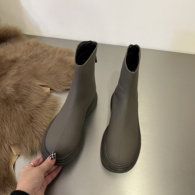 Lihtne mudel tõmblukuga ökonahast naiste saapad