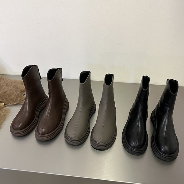 Lihtne mudel tõmblukuga ökonahast naiste saapad