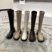 Naiste kunstnahast saapad ümara mudeli ja lukuga