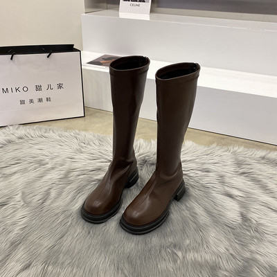 Naiste kunstnahast saapad ümara mudeli ja lukuga